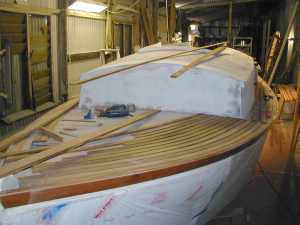 Teak planks were steam bent into shape.